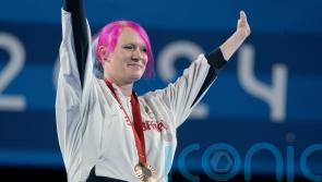 Archer Jodie Grinham delighted to prove motherhood doesn’t end sporting careers