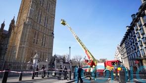 Emergency services called to man climbing up Houses of Parliament