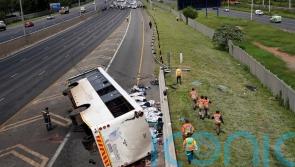 16 dead and dozens injured after bus overturns on South African highway