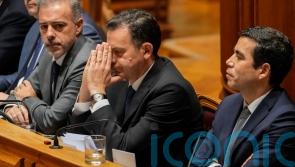 Portugal’s minority government loses confidence vote, triggering early election