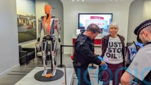 Just Stop Oil protesters arrested after pouring paint over Tesla robot