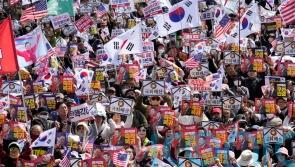 Huge crowds march in rallies for and against South Korea&rsquo;s impeached president
