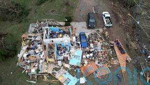 Tornadoes and winds kill at least 37 people in US