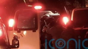 Wife of Palestinian film director says he was savagely beaten outside his home