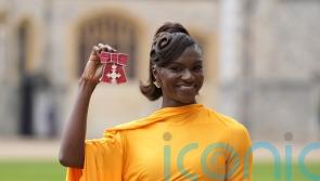 Dina Asher-Smith collects MBE from ‘funny and really charming’ King