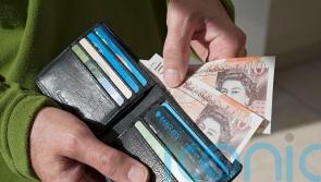 Income growth to stagnate as firms pass on taxes and benefits cut