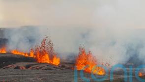 Town and spa evacuated as formerly dormant volcano begins to erupt