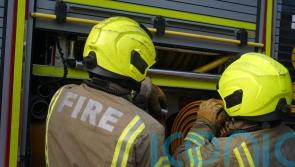 Firefighters extinguish half-kilometre long wildfire as warning remains in place