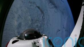 Space tourists return to Earth after private flight over the poles