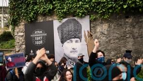 Rival demonstrators come together to oppose Turkey’s government