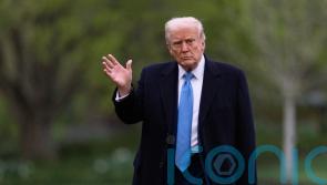 Trump digs heels in as global markets continue to drop over tariffs