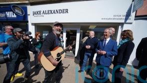 Nigel Farage serenaded in the street on campaign visit