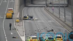 Police vehicles badly damaged in major collision which shut the A1