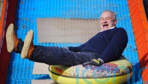 Sir Ed Davey rides rubber ring to highlight pothole problem
