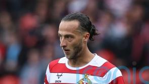 Doncaster and AFC Wimbledon share spoils in battle for automatic promotion