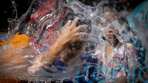 Quake recovery subdues water festival celebrations in Myanmar