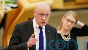Swinney guarantees two-child cap mitigation payments by next April