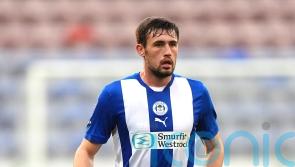 James Carragher nets Wigan winner against Rotherham to secure survival