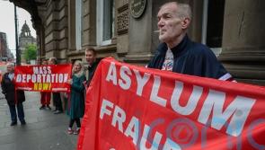 Protesters gather as Swinney chairs special summit to tackle far right