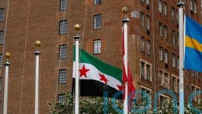 Syria’s foreign minister raises country’s new flag at UN headquarters