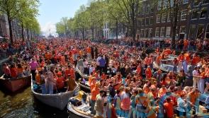Orange-clad crowds cram into Dutch cities to celebrate king’s birthday