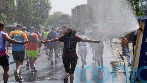 Thousands cross finish line of London Marathon as temperatures hit 22.2C