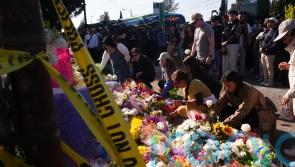 Vancouver attack suspect charged with murder as hundreds hold vigils for victims