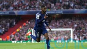Arsenal beaten by Paris St Germain to dent Champions League final hopes