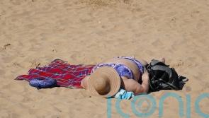 UK set for cooler than average bank holiday after record-breaking hot weather