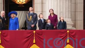 Royals wave as thousands gather to watch VE Day flypast over Buckingham Palace