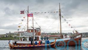 ‘Shetland Bus’ convoy greeted with floating salute as it arrives in Lerwick