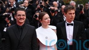 Emma Stone and Pedro Pascal pose on Cannes red carpet for Eddington premiere