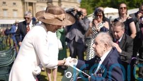 Veteran, 102, recalls war stories as he joins comrades at royal garden party