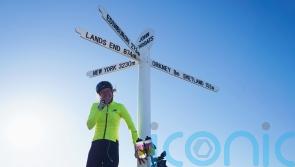 Cyclist with rare condition breaks record for cycling length of UK and back