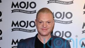 Erasure’s Andy Bell says Blondie’s Debbie Harry helped him come out