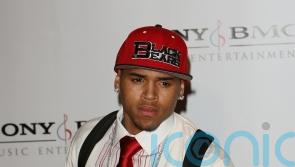 Chris Brown freed on bail by judge after ‘bottle attack’ charge