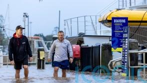 Record floodwaters in eastern Australia leave two dead and two missing