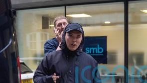 Kneecap star arrives at show with tape over mouth a day after terror charge