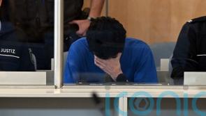 Suspect in fatal knife attack at German festival admits killings as trial starts