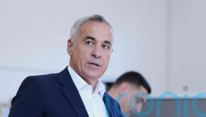 Populist frontrunner in Romania’s cancelled election to step back from politics