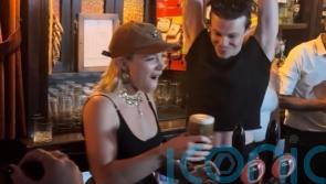 Actor Florence Pugh pours pints at London pub with singer Yungblud