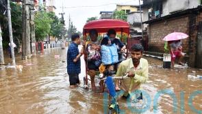 Flash flooding and landslides kill 22 in north-east India