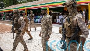 Extremists kill dozens of soldiers at a Mali military base, sources say