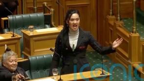 New Zealand parliament suspends three Maori Party politicians over haka protest