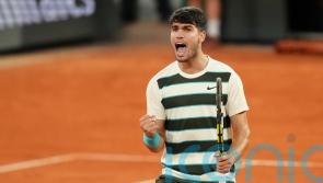 Carlos Alcaraz to defend French Open title in final as Lorenzo Musetti retires