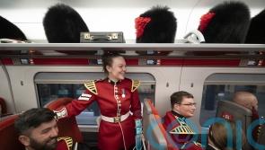 In Pictures: Bearskin caps in the luggage rack as Coldstream Guards return home