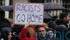 Northern Ireland one petrol bomb away from a racist murder, Belfast rally hears