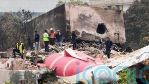 Girls orphaned when father died in Air India crash after scattering wife’s ashes