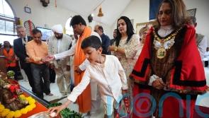 Community visibly emotional during candlelit vigil for Air India crash victims