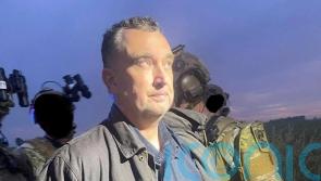 Man suspected of shooting US politicians surrenders to police